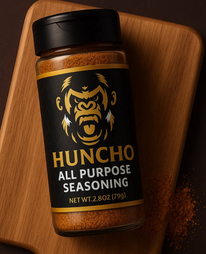 Bottle of Huncho All Purpose Seasoning on a wooden surface